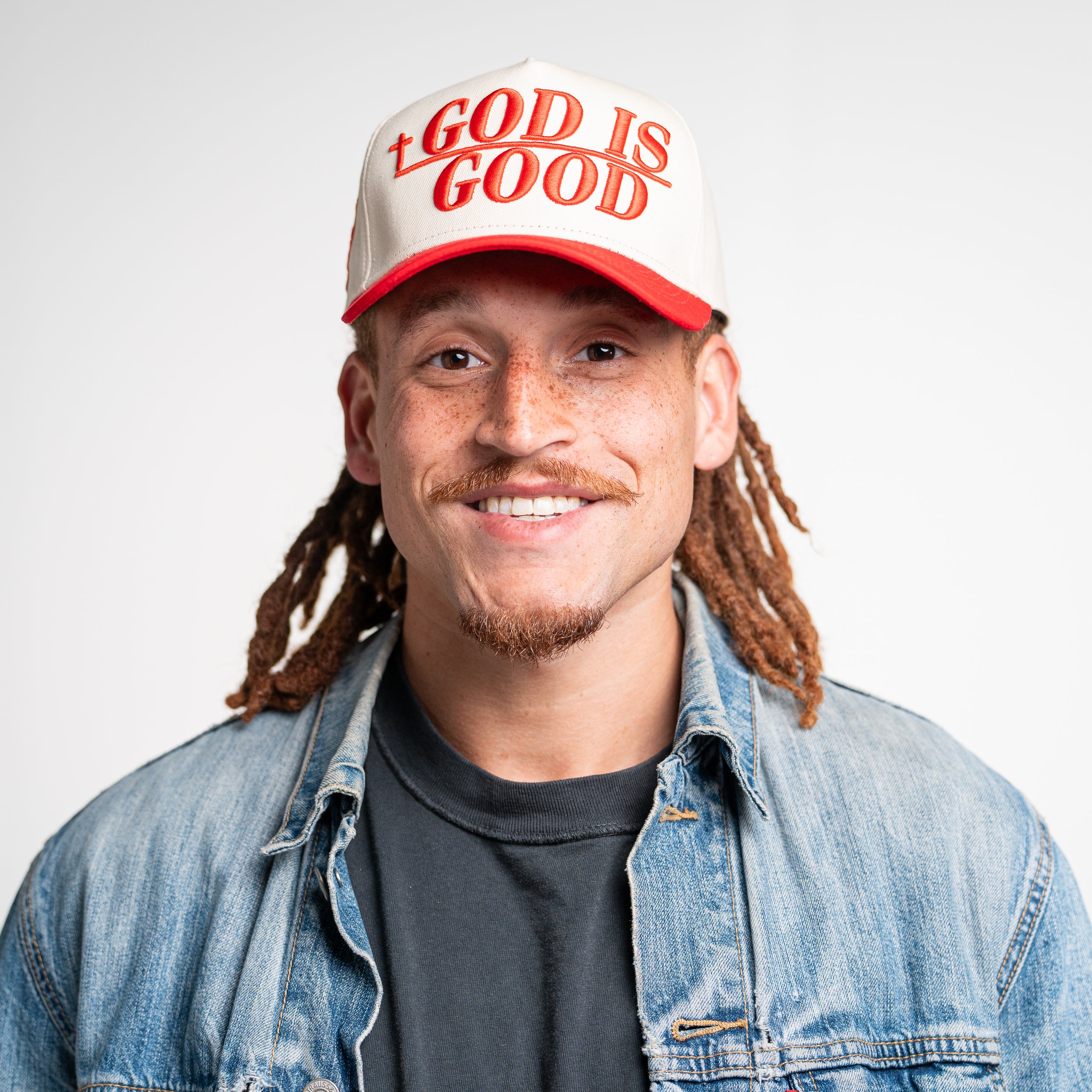 Man wearing God Is Good Hat facing forward, Christian snapback cap styled for modern streetwear expression